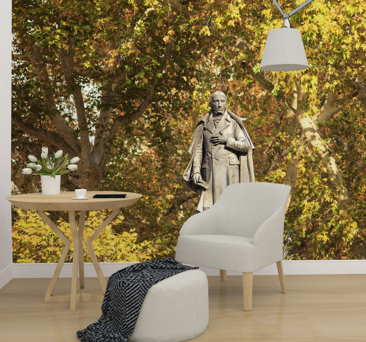 Fototapeta ludzie posąg wśród liści - TenStickers