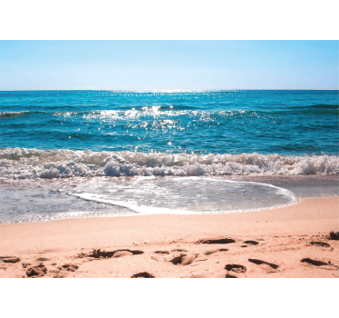 Fototapeta morze spokój nad brzegiem plaży - TenStickers