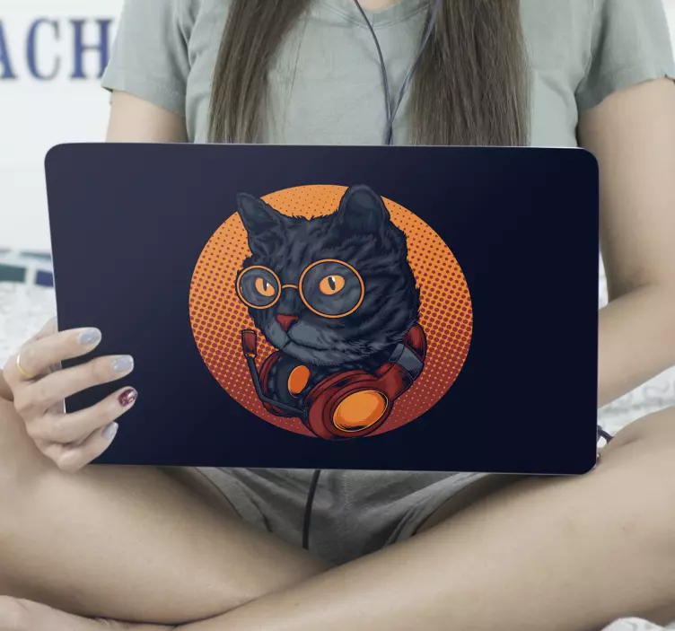 Naklejka na laptopa Kot ze słuchawkami - TenStickers
