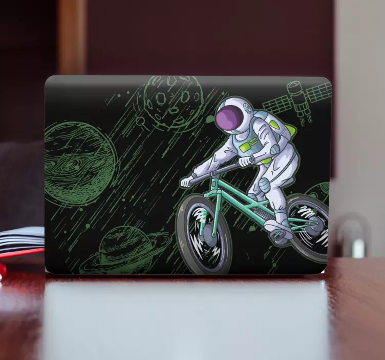 Naklejka na laptopa astronauta na rowerze - TenStickers