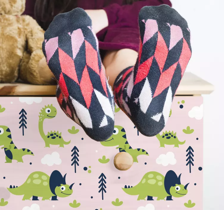 Naklejka na meble Małe zielone dinozaury na różowym tle - TenStickers